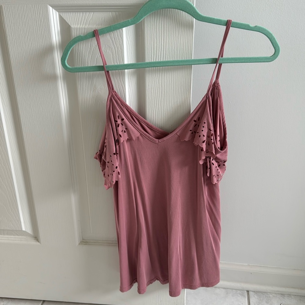 Large pink tank top with lacey flower sleeves. Brand is Alya.